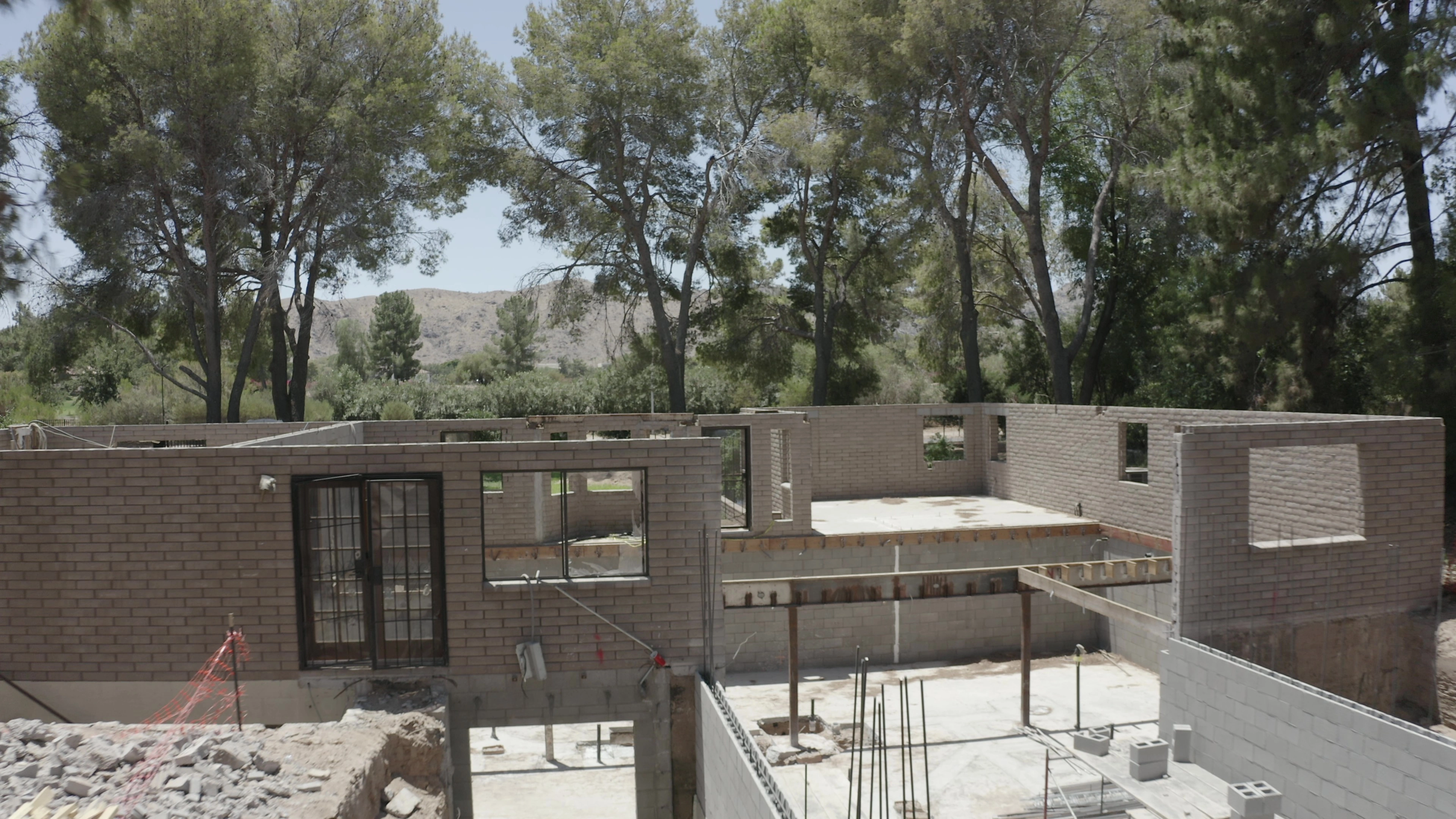 Concrete block walls and steel beams during structural framing of a Scottsdale home addition by 123 Remodeling