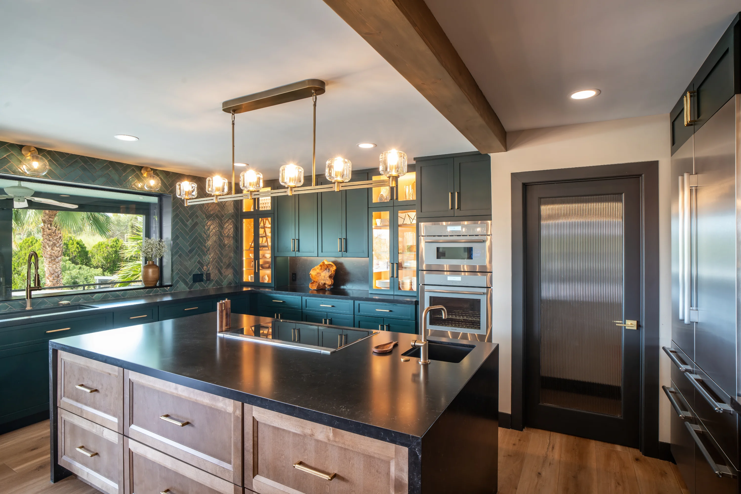 Island with linear chandelier