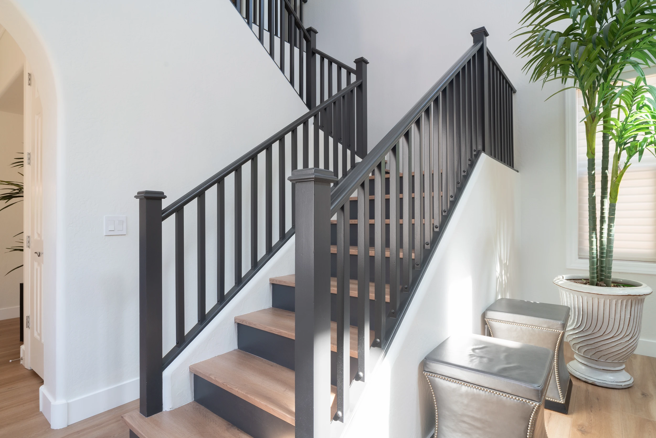 Renovated staircase with Iron Ore railings