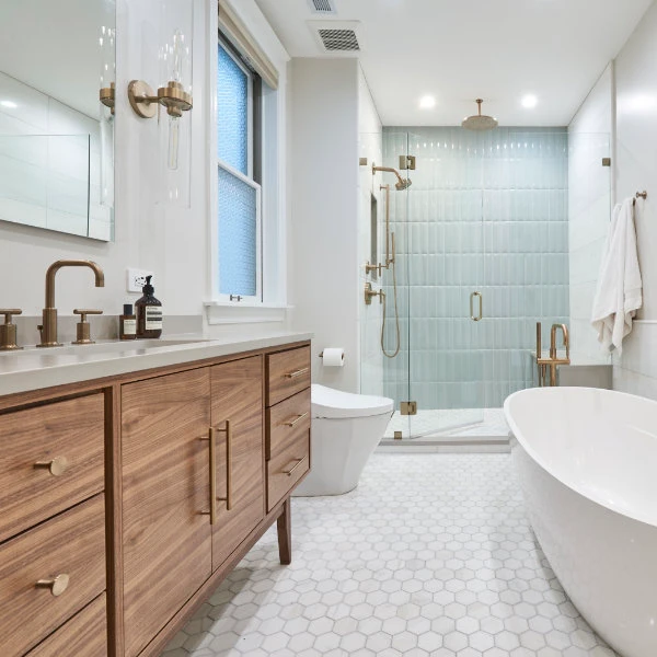 Upscale bathroom wihh freestanding vanity and tub
